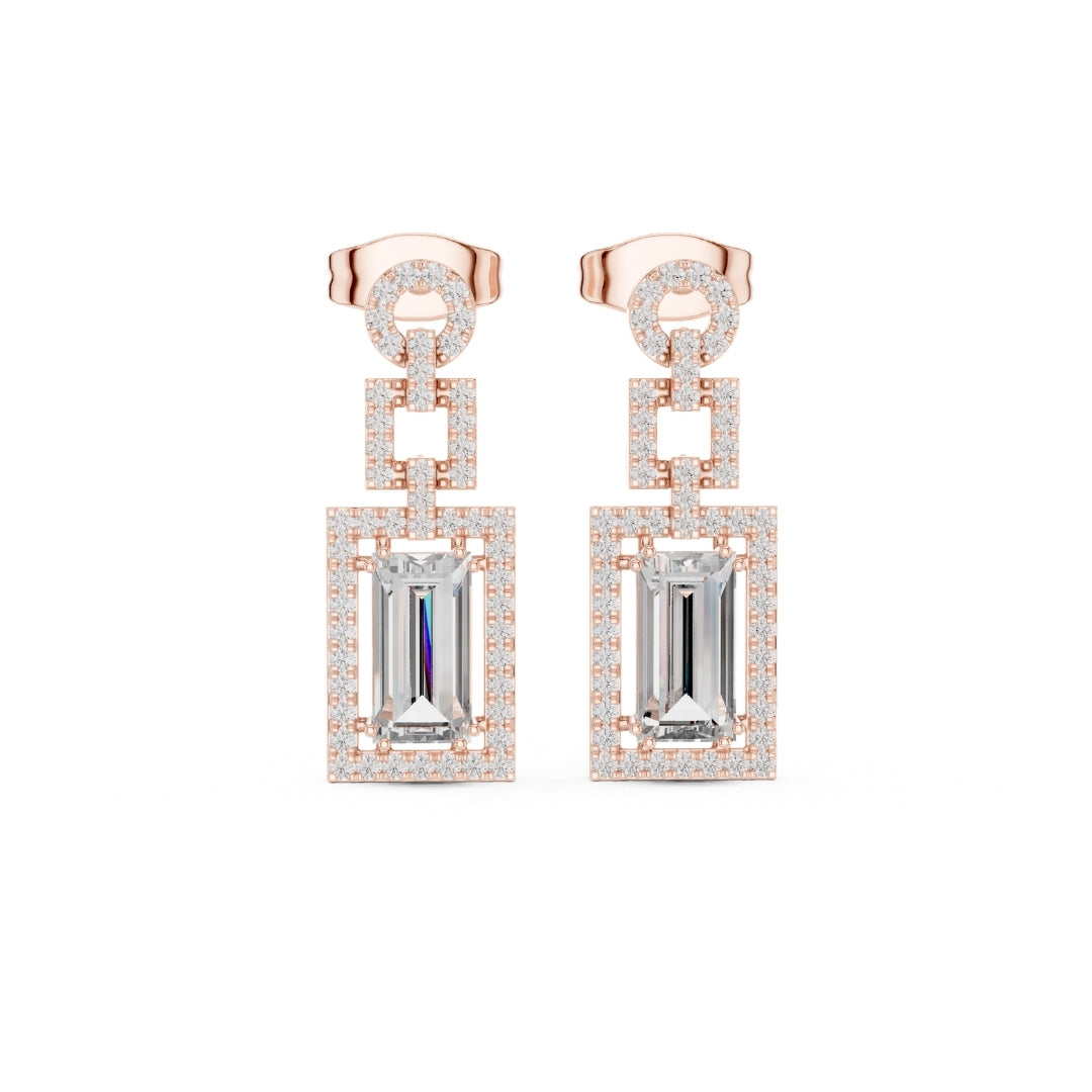 Rose gold and silver earrings with rectangular moissanite gemstones on a white background