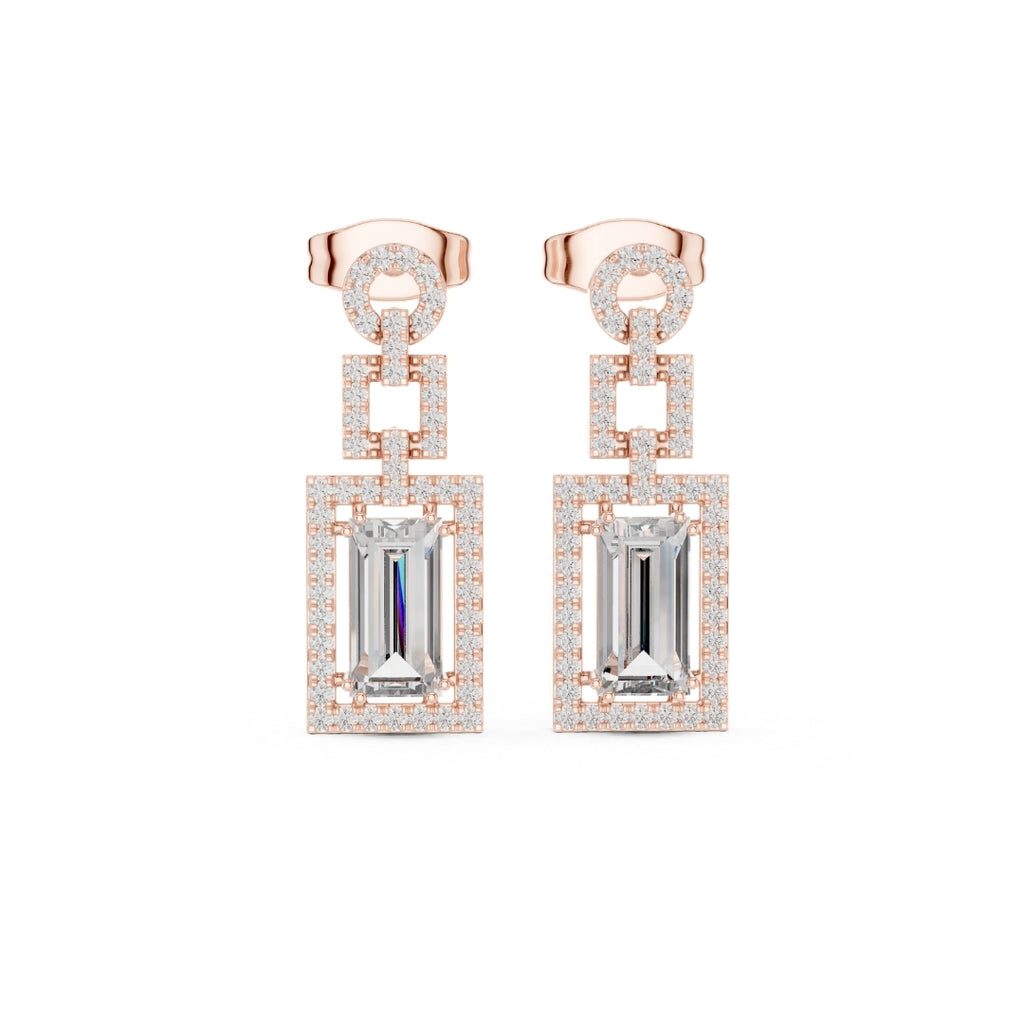 Rose gold and silver earrings with rectangular moissanite gemstones on a white background