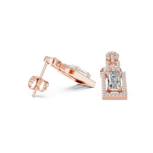 Load image into Gallery viewer, Rose gold earrings with a central moissanite gemstone on a white background