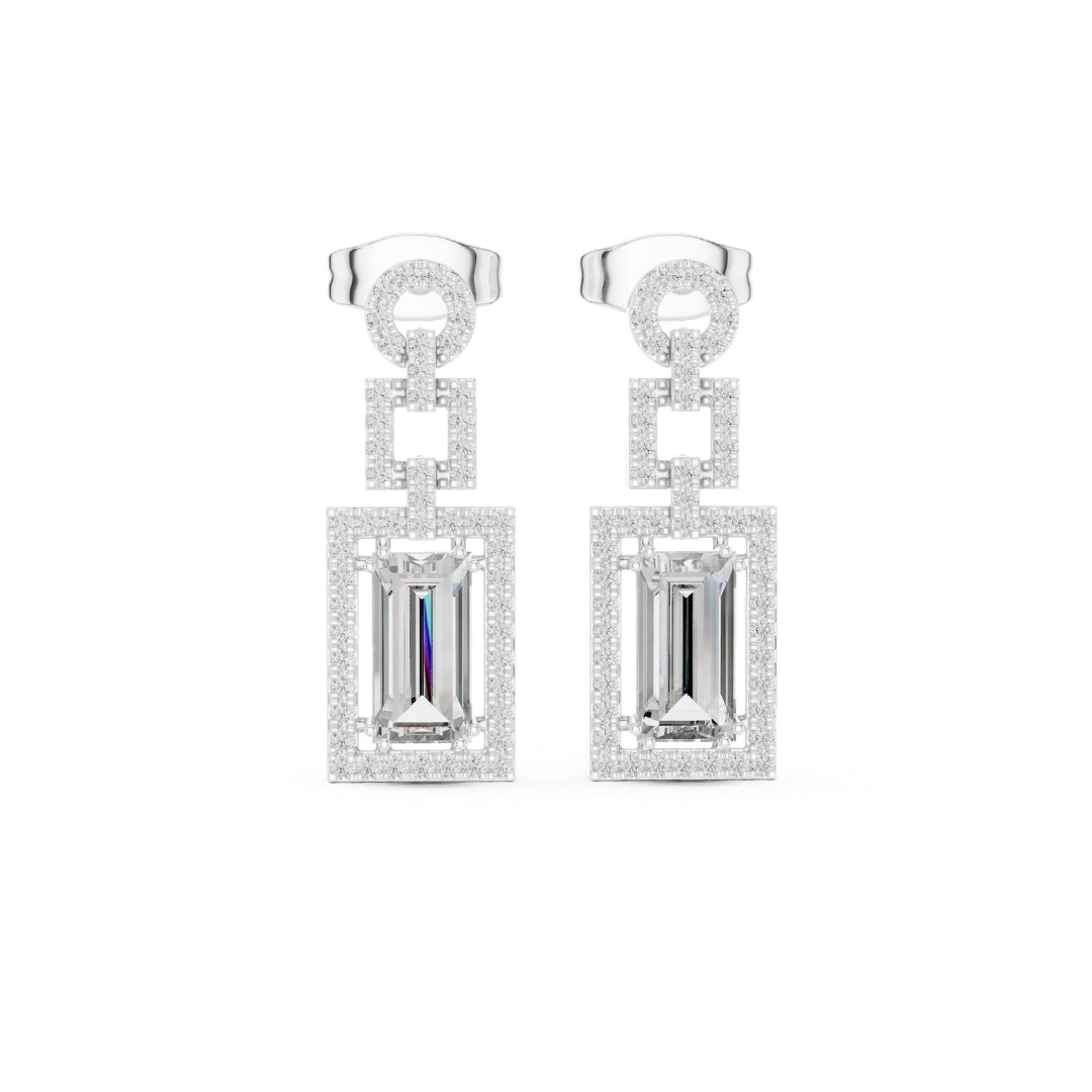 Pair of silver moissanite earrings with rectangular gemstones on a white background