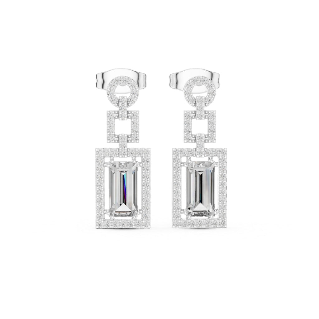 Pair of silver moissanite earrings with rectangular gemstones on a white background
