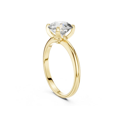 Gold ring with a 1ct moissanite clear gemstone on a white background