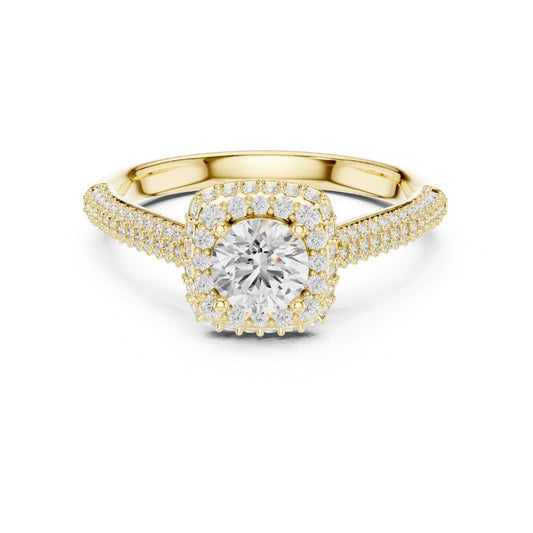 Gold ring with a moissanite diamond center stone on a white background
