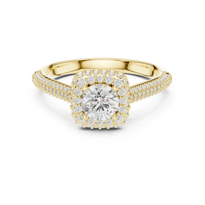 Gold ring with a moissanite diamond center stone on a white background