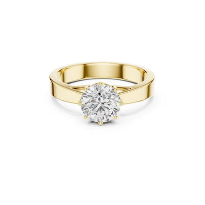 Gold ring with a 1ct moissanite diamond on a white background