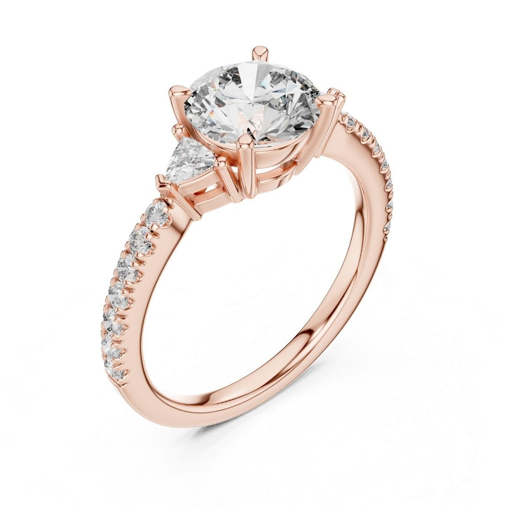 Rose gold ring with a large moissanite diamond and smaller diamonds on the band against a white background