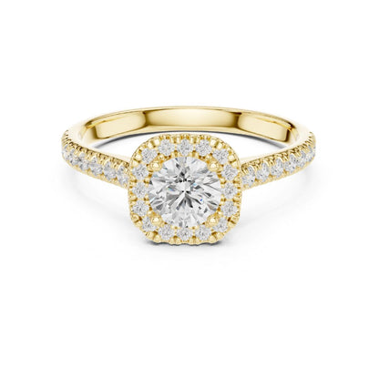 Gold ring with a moissanite diamond on a white background