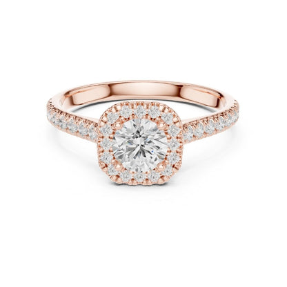 Rose gold ring with a moissanite diamond on a white background