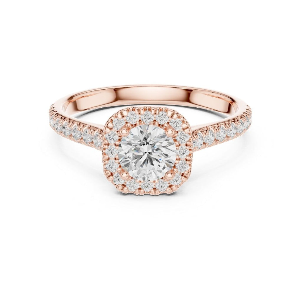 Rose gold ring with a moissanite diamond on a white background