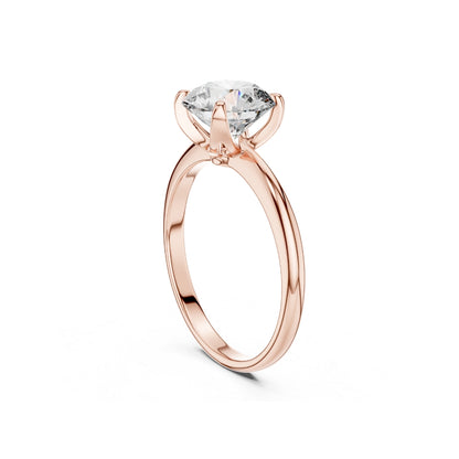 Rose gold ring with a 1ct moissanite diamond on a white background