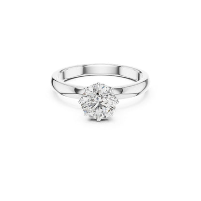 Silver ring with a 1ct moissanite diamond on a white background