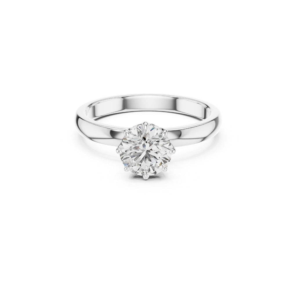Silver ring with a 1ct moissanite diamond on a white background