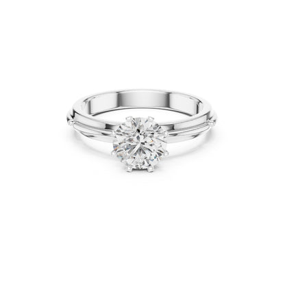 Silver ring with a 1ct moissanite diamond on a white background