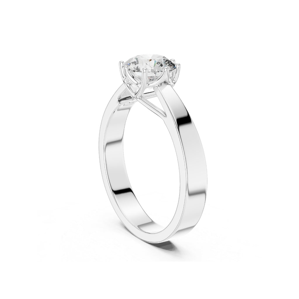 Silver ring with a 1ct moissanite diamond on a white background