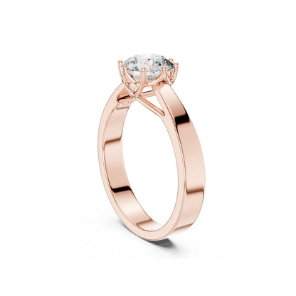 Rose gold ring with a 1ct moissanite diamond on a white background