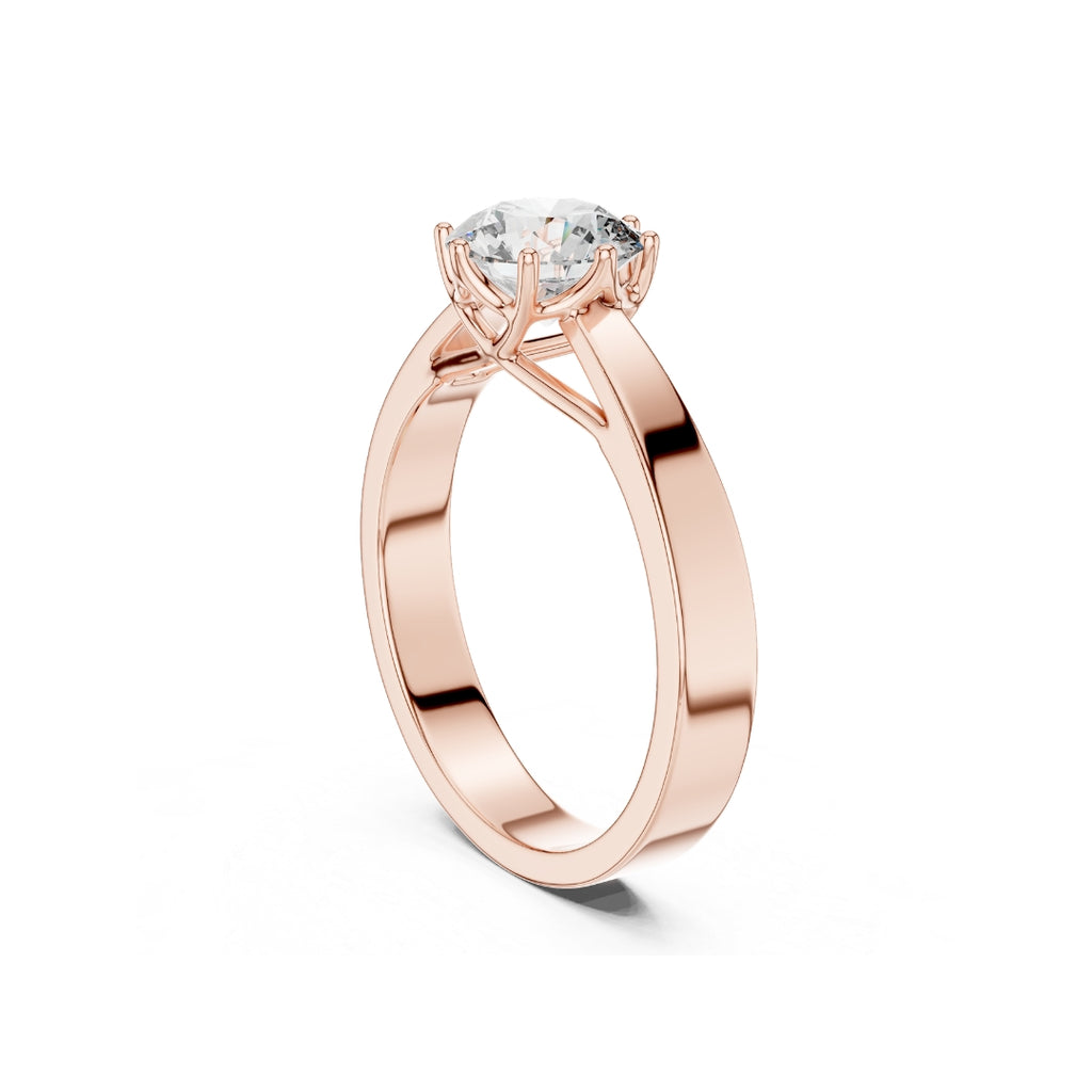 Rose gold ring with a 1ct moissanite diamond on a white background