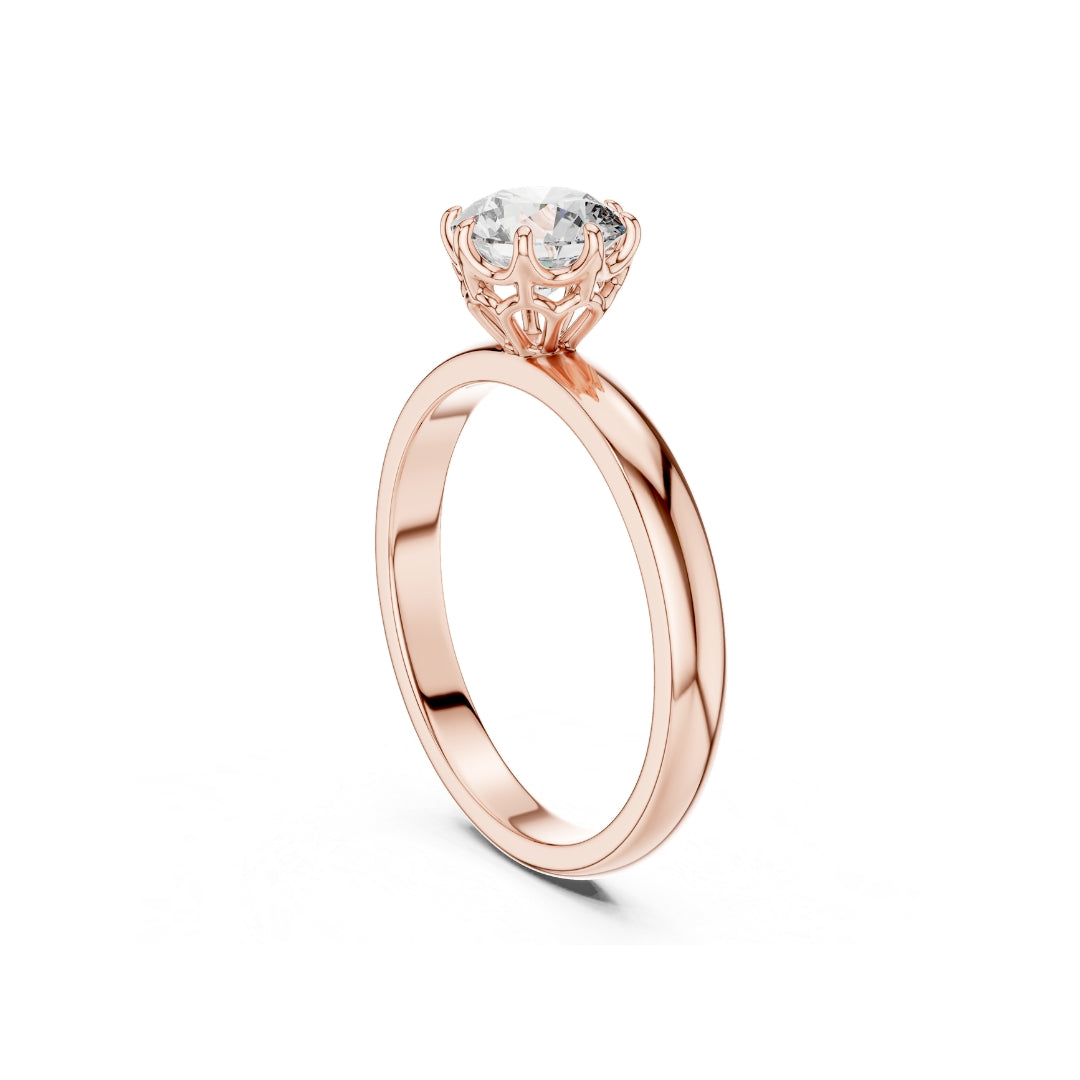 Rose gold ring with a 1ct moissanite diamond on a white background
